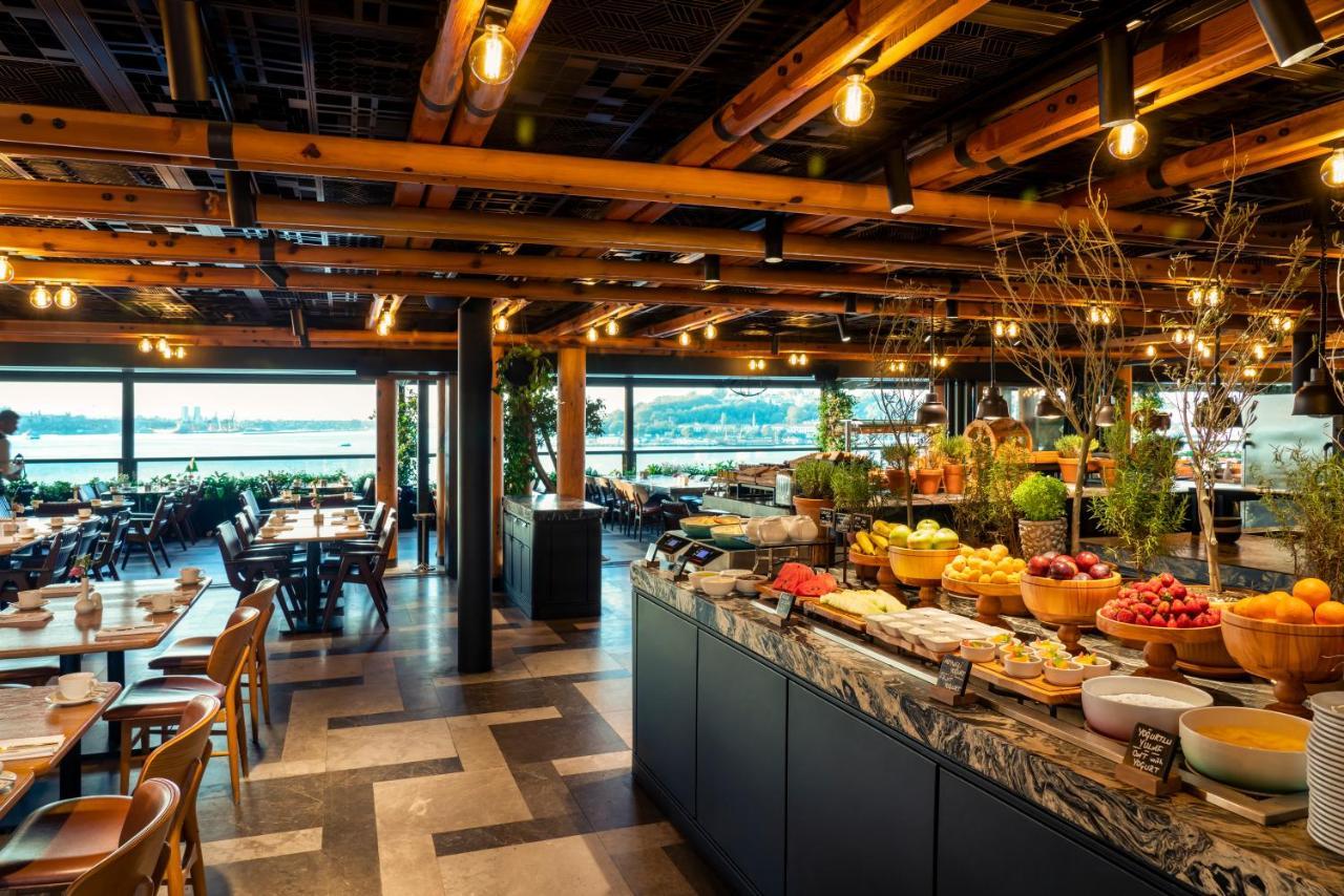 Novotel Istanbul Bosphorus Hotel Esterno foto The interior of the restaurant